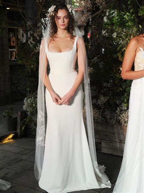 Alexandra grecco - Margaux is a true work of art. This off-the-shoulder fitted gown has a stunning structured bodice with draped details and detachable long sleeves. Details. Off-White. Silk or Matte Stretch Crepe. Off-the-Shoulder. Structured Draped Bodice. Made-to-order in NYC. Styling Options. 
